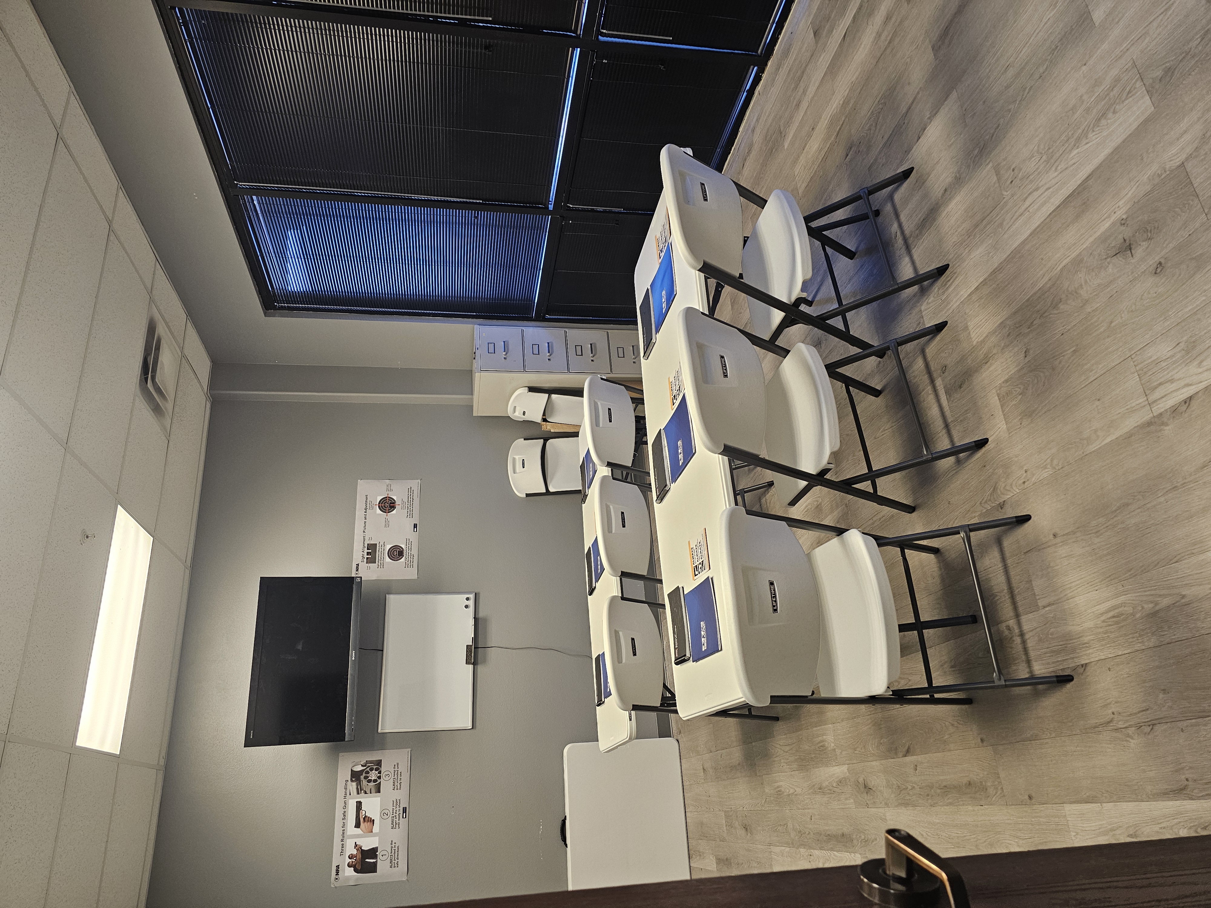 Pinnacle Arms training classroom with NRA instructional posters